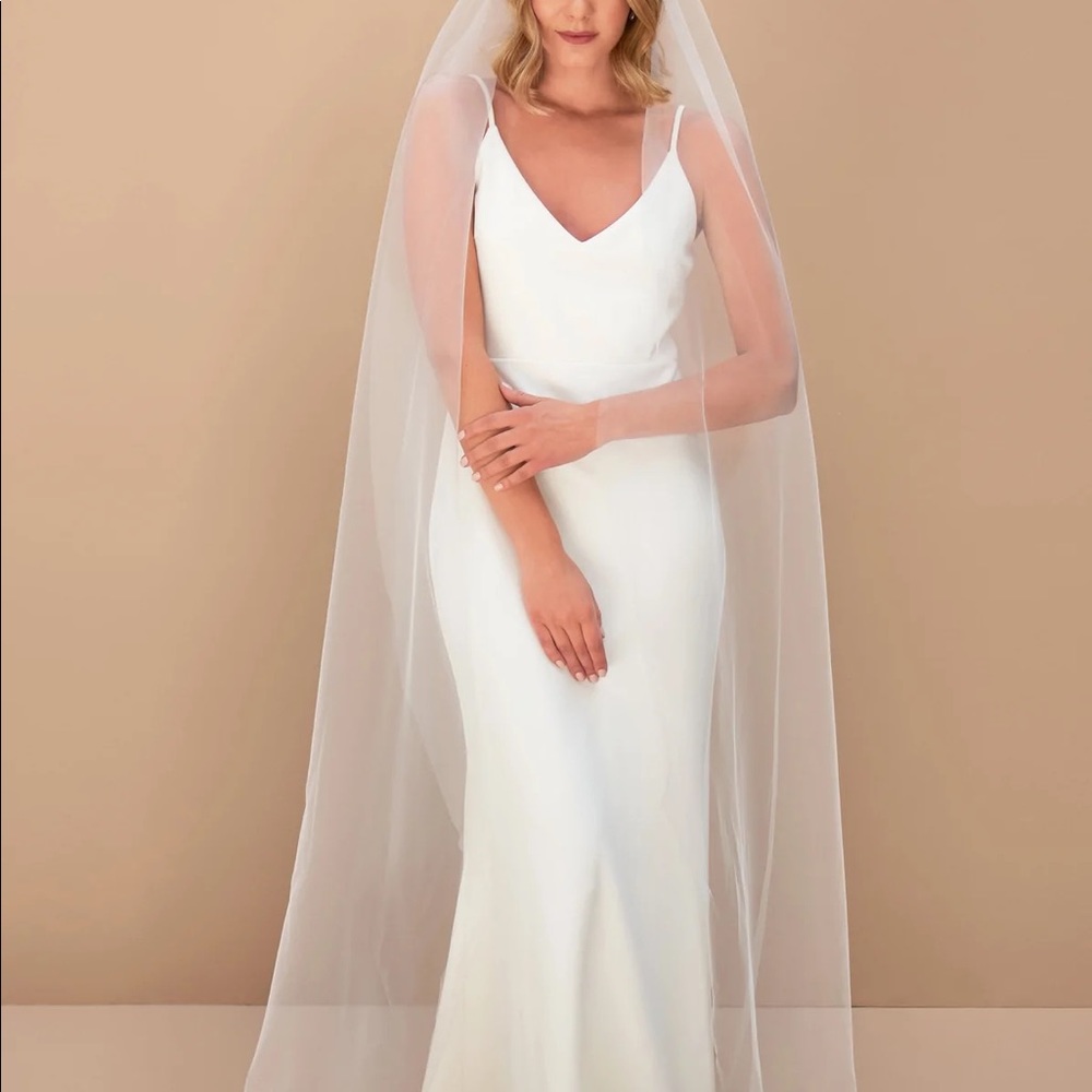 Floor length, (feels soft, not scratchy), ivory veil